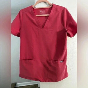 Figs Casma Three pocket scrub top small in a pink mauve color‎